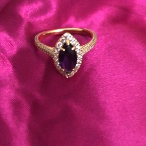 Lab created blue sapphire on an 18k yellow gold band ring